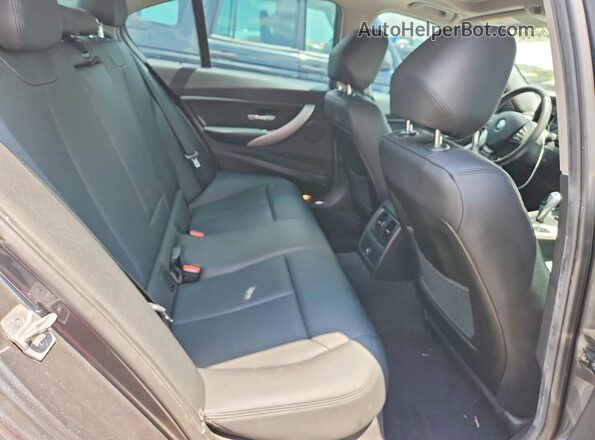 WBA8E5G58HNU41986 2017 BMW 3 SERIES Gray Vista de los asientos traseros