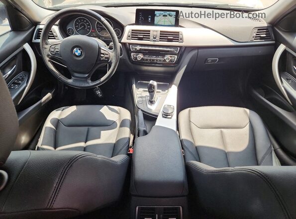WBA8E5G58HNU41986 2017 BMW 3 SERIES Gray Vista del salpicadero