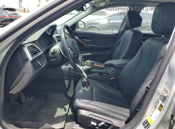 WBA8E5G5XGNT41886 2016 BMW 3 SERIES Silver Вид салону спереду