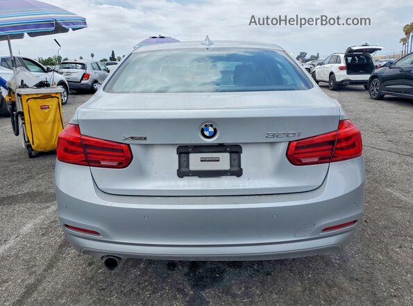 WBA8E5G5XGNT41886 2016 BMW 3 SERIES Silver Вид ззаду