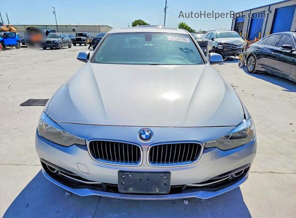 WBA8E9C53GK648105 2016 BMW 3 SERIES Серебряный Вид спереди