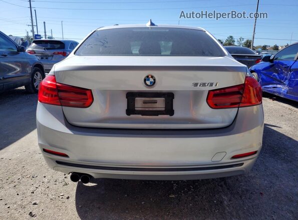 WBA8E9G57GNT82063 2016 BMW 3 SERIES Silver Vista trasera