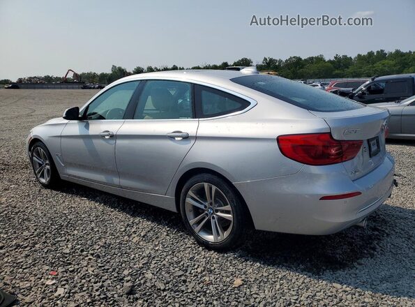 WBA8Y3C59JG451535 2018 BMW 3 SERIES Silver Trasero izquierdo