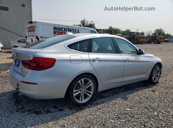 WBA8Y3C59JG451535 2018 BMW 3 SERIES Silver Trasero derecho