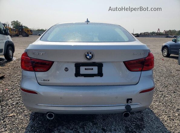 WBA8Y3C59JG451535 2018 BMW 3 SERIES Silver Vista trasera