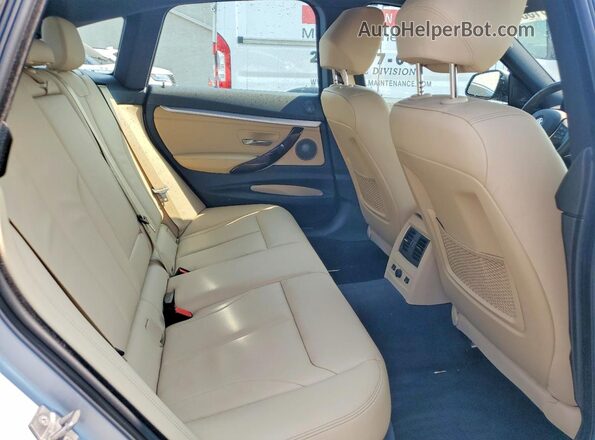WBA8Y3C59JG451535 2018 BMW 3 SERIES Silver Vista de los asientos traseros