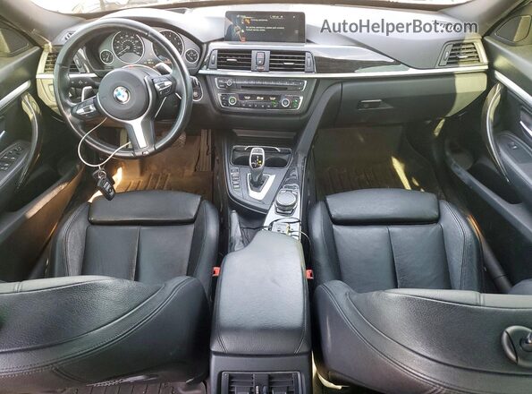 WBA8Z5C54GG501453 2016 BMW 3 SERIES Gray Vista del salpicadero