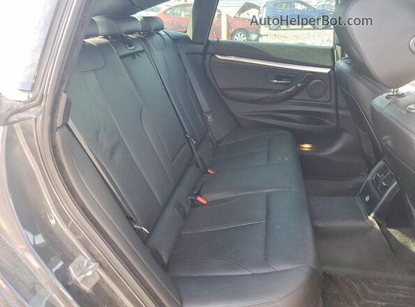 WBA8Z5C54GG501453 2016 BMW 3 SERIES Gray Vista de los asientos traseros