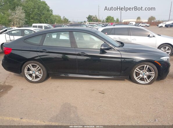 WBA8Z5C57GG501415 2016 BMW 3 SERIES Black Vista interior trasera