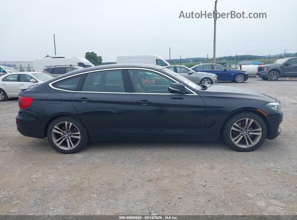 WBA8Z9C32HG453507 2017 BMW 3 SERIES Black Սալոնի հետևի տեսք