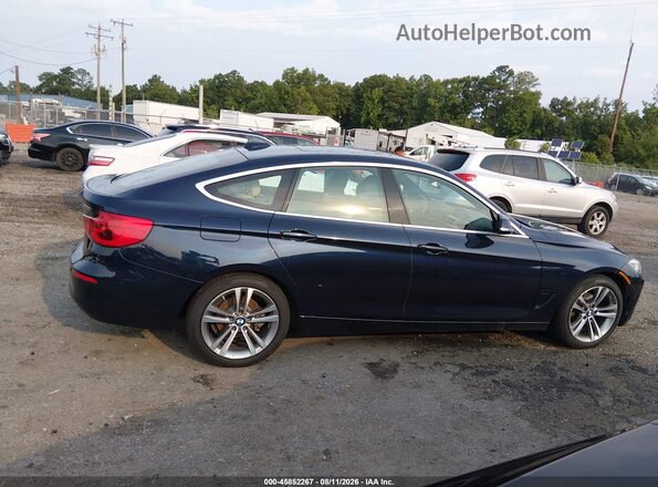 WBA8Z9C51HG453306 2017 BMW 3 SERIES Dark Blue Սալոնի հետևի տեսք