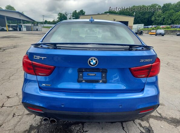 WBA8Z9C51KB220823 2019 BMW 3 SERIES Blue Vista trasera