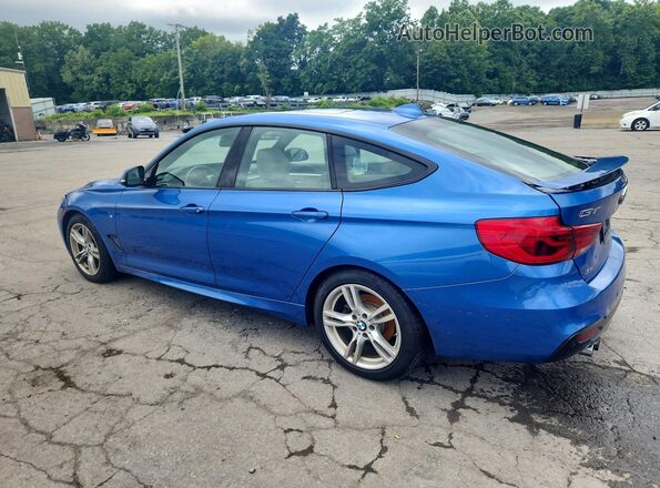 WBA8Z9C51KB220823 2019 BMW 3 SERIES Blue Trasero izquierdo