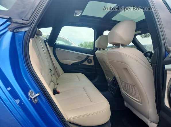 WBA8Z9C51KB220823 2019 BMW 3 SERIES Blue Vista de los asientos traseros