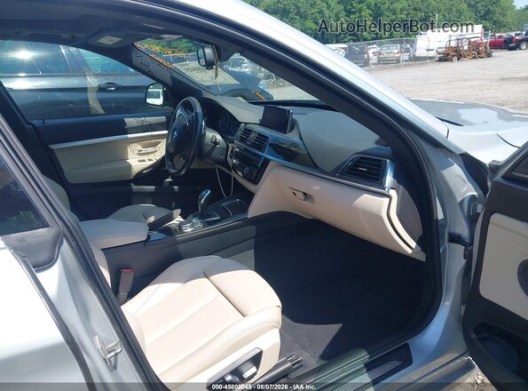 WBA8Z9C52JG827881 2018 BMW 3 SERIES Silver წინა სალონის ხედი