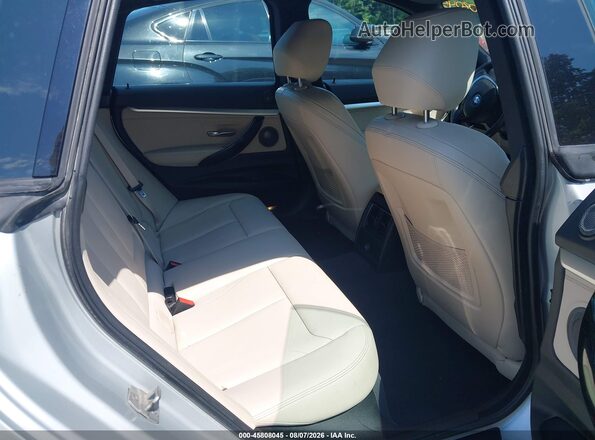 WBA8Z9C52JG827881 2018 BMW 3 SERIES Silver VIN კოდის სტიკერის ხედი