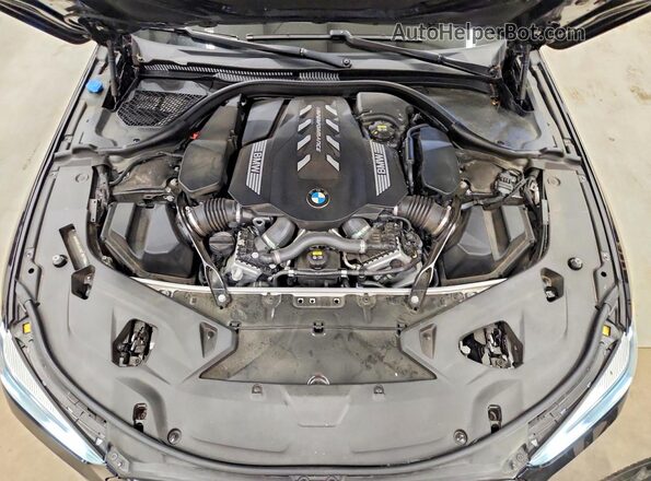 WBABC4C01MCF18917 2021 BMW M8 Blue Вид задньої частини салону