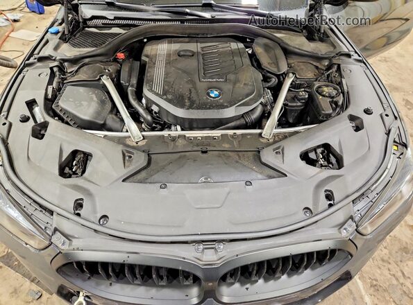 WBADZ4C01RCP56178 2024 BMW 8 SERIES Gray Սալոնի հետևի տեսք