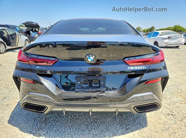 WBAGV8C01TCX05383 2026 BMW M8 Black Vista trasera