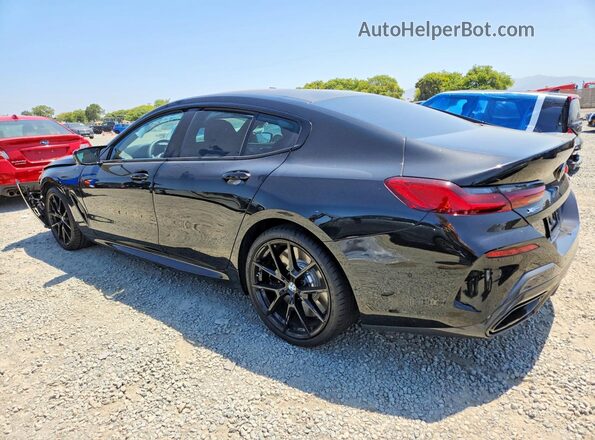 WBAGV8C01TCX05383 2026 BMW M8 Black Trasero izquierdo