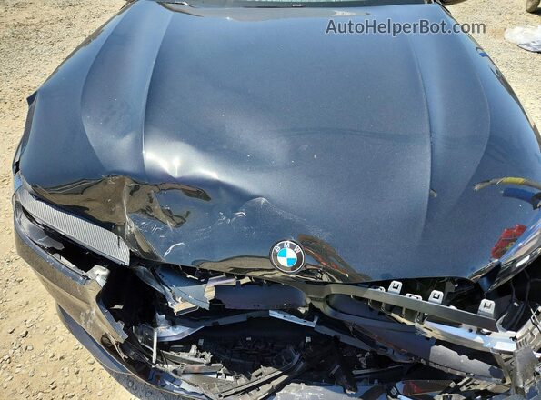 WBAGV8C01TCX05383 2026 BMW M8 Black Vista interior trasera