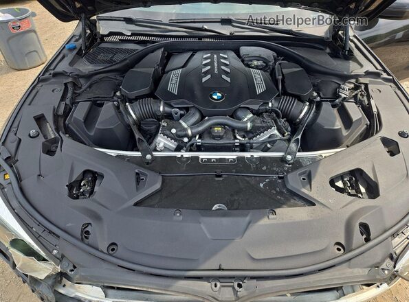WBAGV8C04LCD43519 2020 BMW M8 Black Вид задньої частини салону