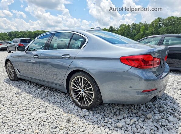 WBAJA5C30HG894389 2017 BMW 5 SERIES Silver Trasero izquierdo