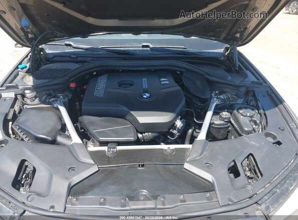 WBAJA5C53JWA39914 2018 BMW 5 SERIES Gray Vista trasera