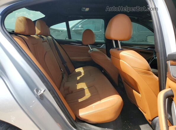 WBAJA5C54JWA38500 2018 BMW 5 SERIES Silver Rear interior view