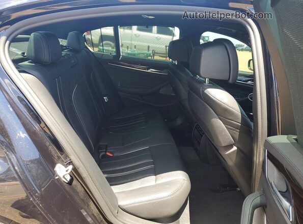 WBAJB9C50KB464047 2019 BMW M5 Black Widok tylnych siedzeń