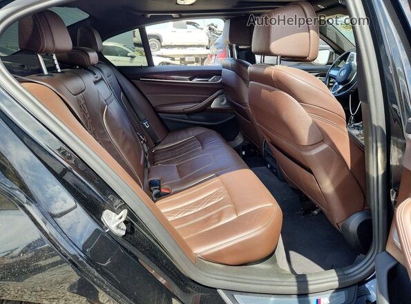 WBAJB9C51JB036065 2018 BMW M5 Black Հետևի նստատեղերի տեսք