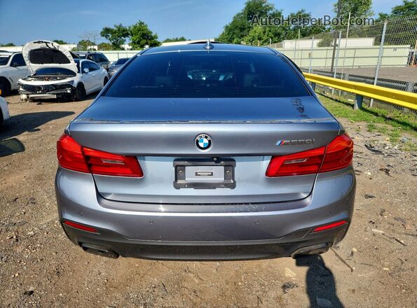 WBAJB9C52KB287713 2019 BMW M5 Gray Widok z tyłu