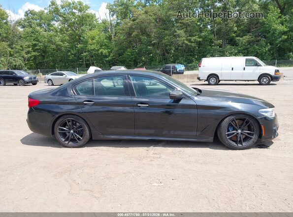 WBAJB9C59JB049453 2018 BMW 5 SERIES Black Widok wnętrza z tyłu