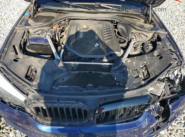 WBAJE5C51KWW15860 2019 BMW 5 SERIES Синий Вид задней части салона