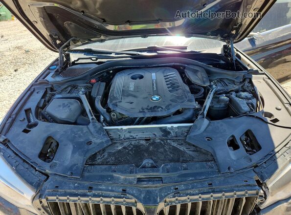 WBAJE7C33HG479504 2017 BMW 5 SERIES Charcoal უკანა სალონის ხედი