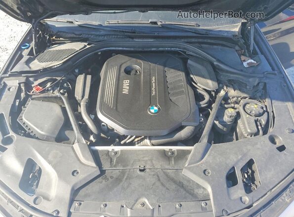 WBAJE7C50JG891886 2018 BMW 5 SERIES Black Widok wnętrza z tyłu