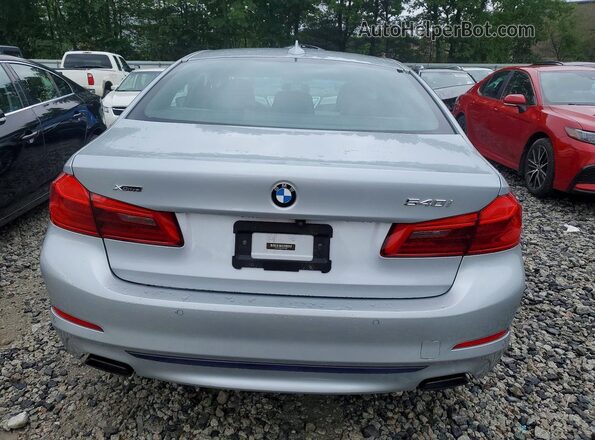 WBAJE7C52JWC55267 2018 BMW 5 SERIES Silver Vista trasera