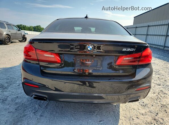 WBAJR3C00LCD31087 2020 BMW 5 SERIES Черный Вид сзади