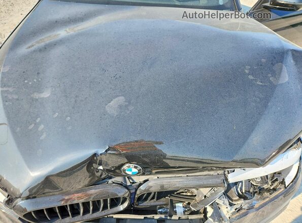 WBAJR3C00LCD31087 2020 BMW 5 SERIES Черный Вид задней части салона