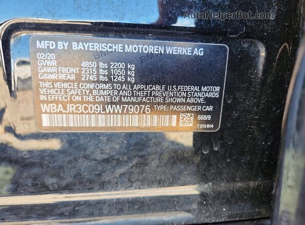 WBAJR3C09LWW79076 2020 BMW 5 SERIES Black Engine compartment view