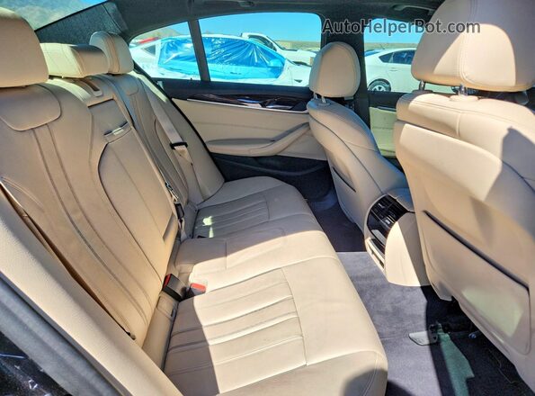 WBAJR3C09LWW79076 2020 BMW 5 SERIES Black Rear seats view