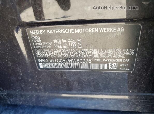 WBAJR7C05LWW80975 2020 BMW 5 SERIES Black Vista del compartimento del motor