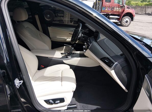 WBAJS3C00LCE54876 2020 BMW 5 SERIES Черный Вид салона спереди