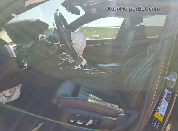 WBAJS3C08LCD16017 2020 BMW 5 SERIES Black Front interior view