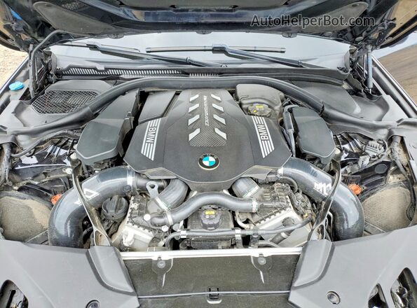 WBAJS7C03LCE14573 2020 BMW M5 Blue Vista interior trasera