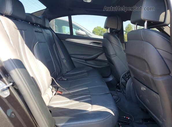 WBAJS7C05LCD94763 2020 BMW M5 Gray Widok tylnych siedzeń