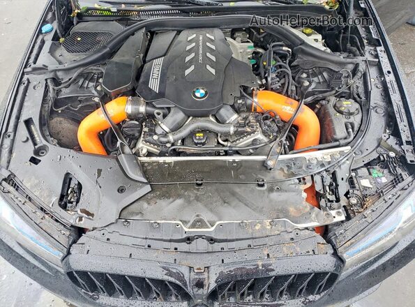 WBAJS7C0XLCD41167 2020 BMW M5 Gray Widok wnętrza z tyłu