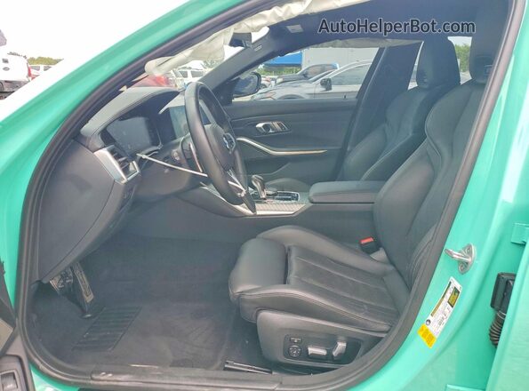 WBS33AY05NFM50643 2022 BMW M3 Turquoise Вид салону спереду