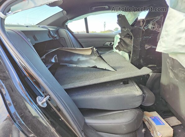 WBS43AY05PFN51110 2023 BMW M3 Black Vista de los asientos traseros