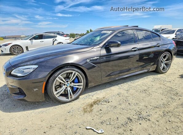 WBS6E9C53GGF92644 2016 BMW M6 Black Հետևի ձախ